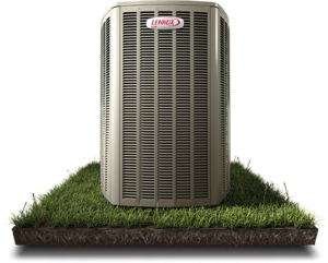 This is a heat pump sitting on top of grass