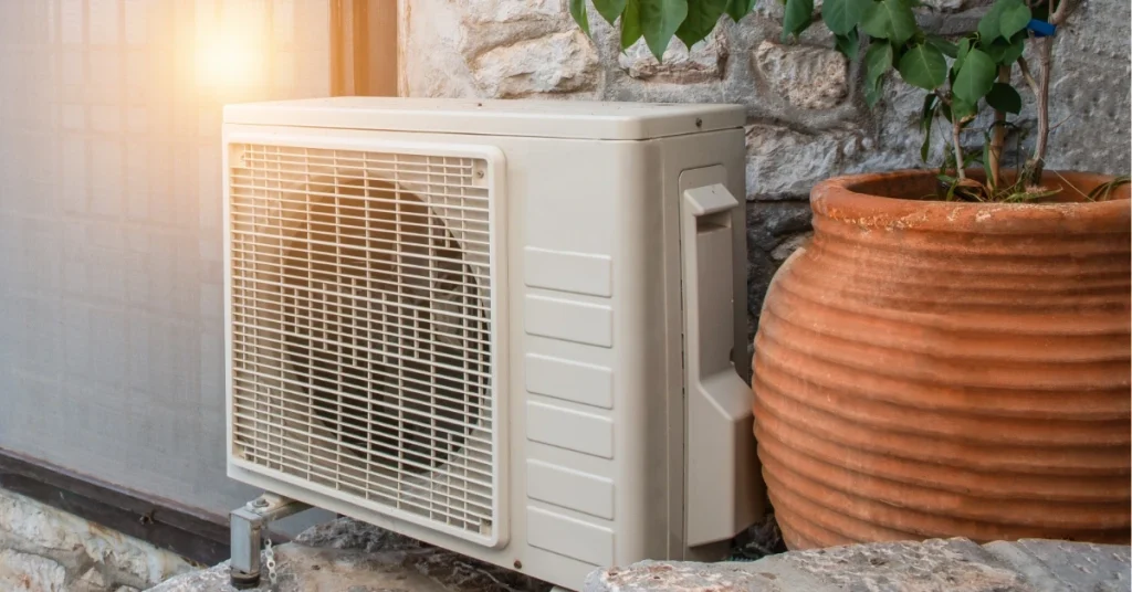 Modern heat pump unit installed outdoors showing energy efficient alternative to gas furnace heating systems