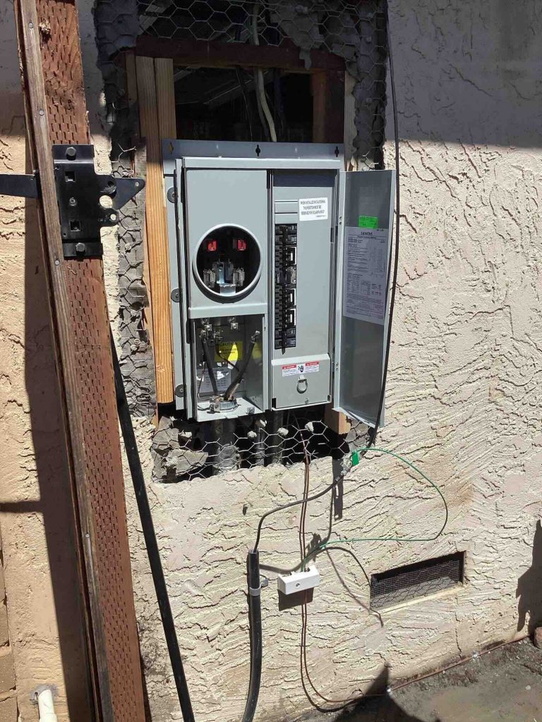 The completed Siemens 200-amp panel with surge protection, installed and ready for inspection. A dramatic upgrade from the Zinsco panel this home had lived with for decades.