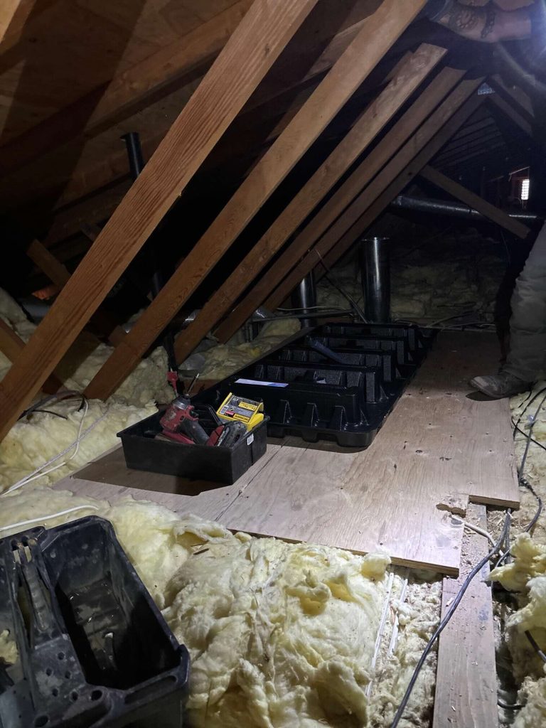 New air handler and duct plenum installed in attic during Lennox heat pump conversion in Monterey County by Bellows technicians
