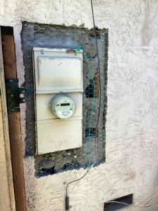 The old panel removed and meter base exposed during the San Jose upgrade. This is the point where our team evaluates the existing service entrance before the new panel goes in.