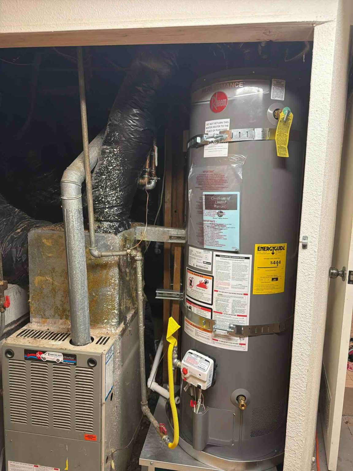 Bellows Plumbing technician completing permitted water heater replacement in Aptos, Santa Cruz County California