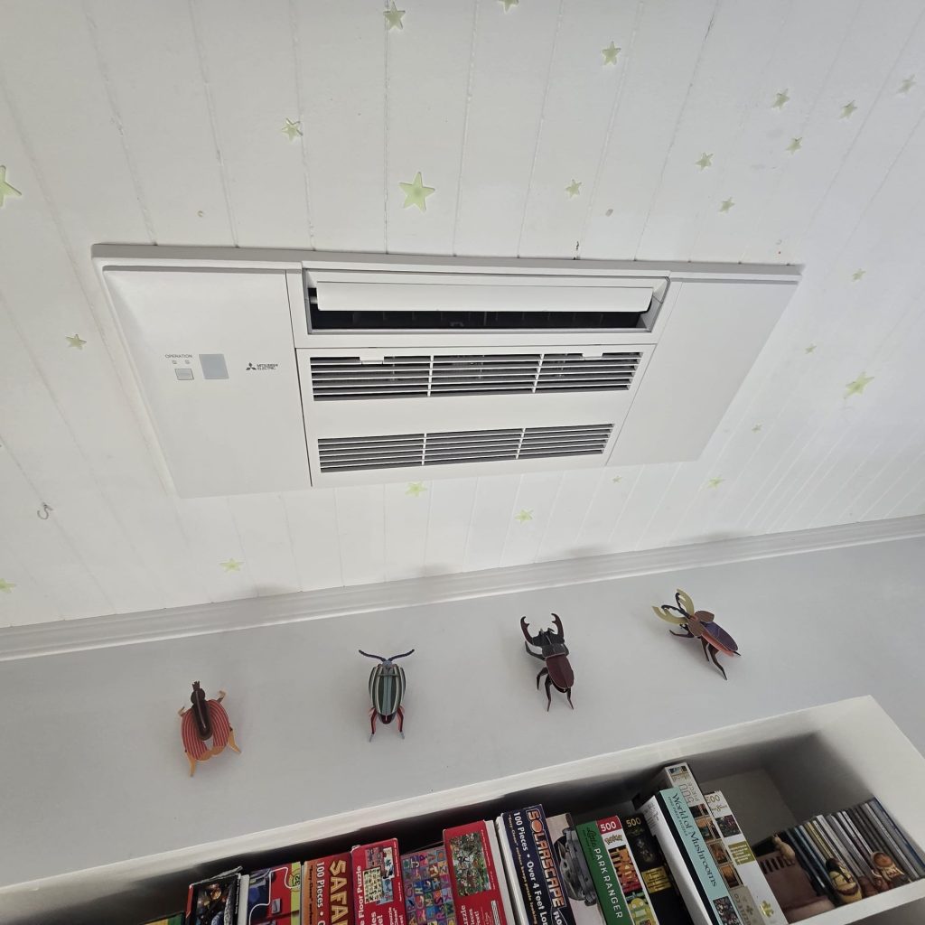 Mitsubishi flush ceiling-mount cassette air handler installed in a Fairfax California bedroom ceiling